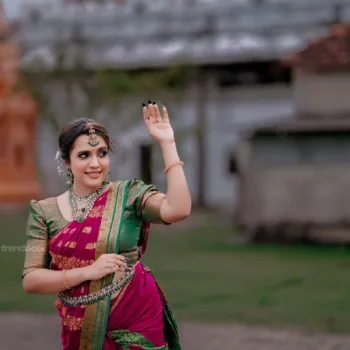 Sivakumar Nilaxshi magenta bridal saree
