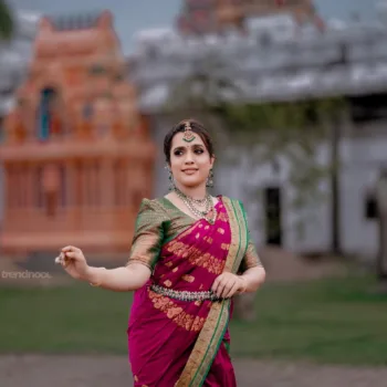 Sivakumar Nilaxshi magenta bridal saree