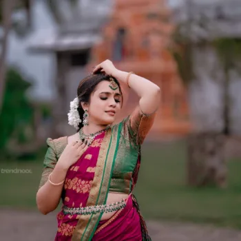 Sivakumar Nilaxshi magenta bridal saree