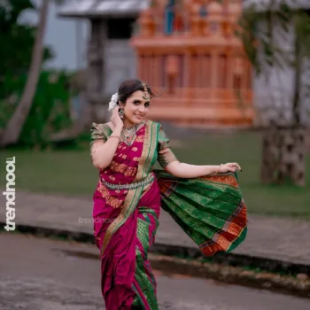 Sivakumar Nilaxshi magenta bridal saree