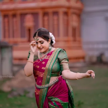 Sivakumar Nilaxshi magenta bridal saree