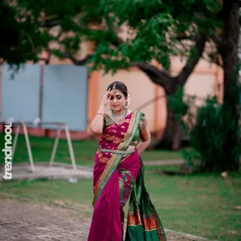 Sivakumar Nilaxshi magenta bridal saree
