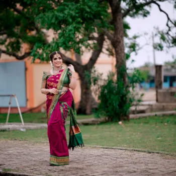 Sivakumar Nilaxshi magenta bridal saree