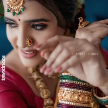 Sivakumar Nilaxshi yellow bridal saree