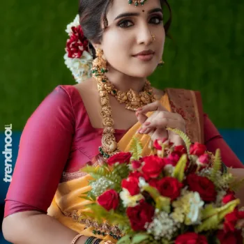 Sivakumar Nilaxshi yellow bridal saree
