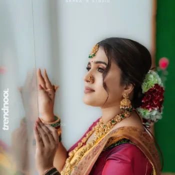 Sivakumar Nilaxshi yellow bridal saree