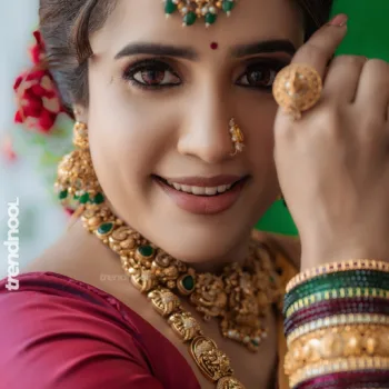 Sivakumar Nilaxshi yellow bridal saree