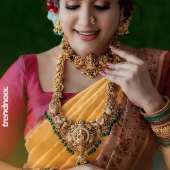 Sivakumar Nilaxshi yellow bridal saree